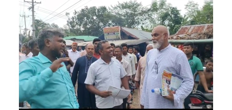 বৃষ্টিতেও বিএনপি'র ৩১ দফা লিফলেট বিতরন করলেন - ইঞ্জিঃ মাসুদ 